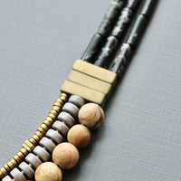 Triple Strand Black and Gray Beaded Necklace