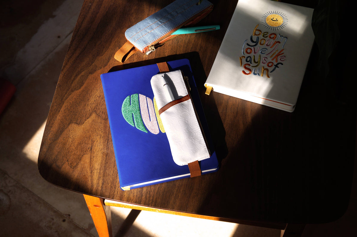 Golden Hour white Embossed Notebook Pouch