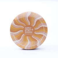 Groovy swirl tin: amber + ginger + jasmine 14 oz candle