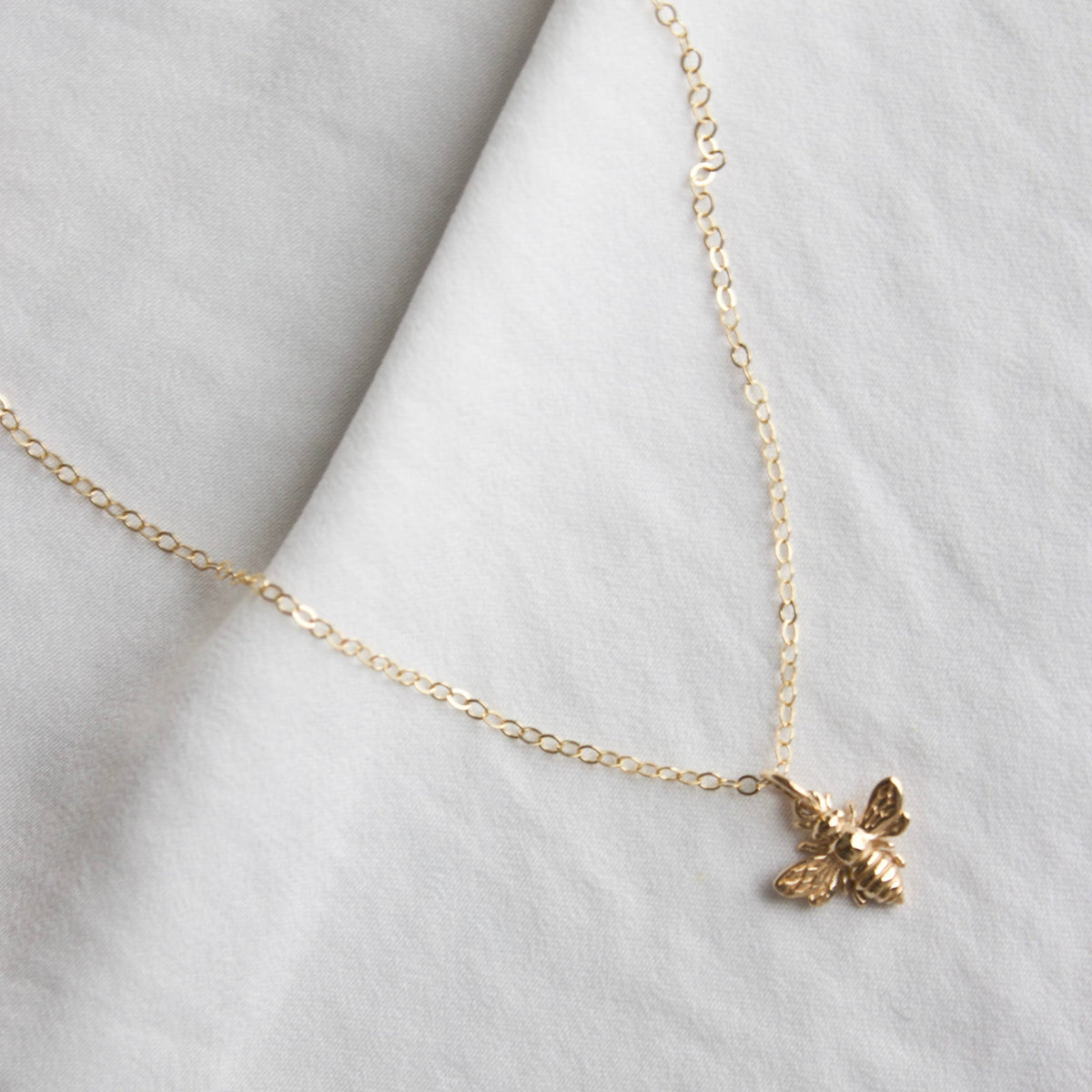 BEE CHARM NECKLACE
